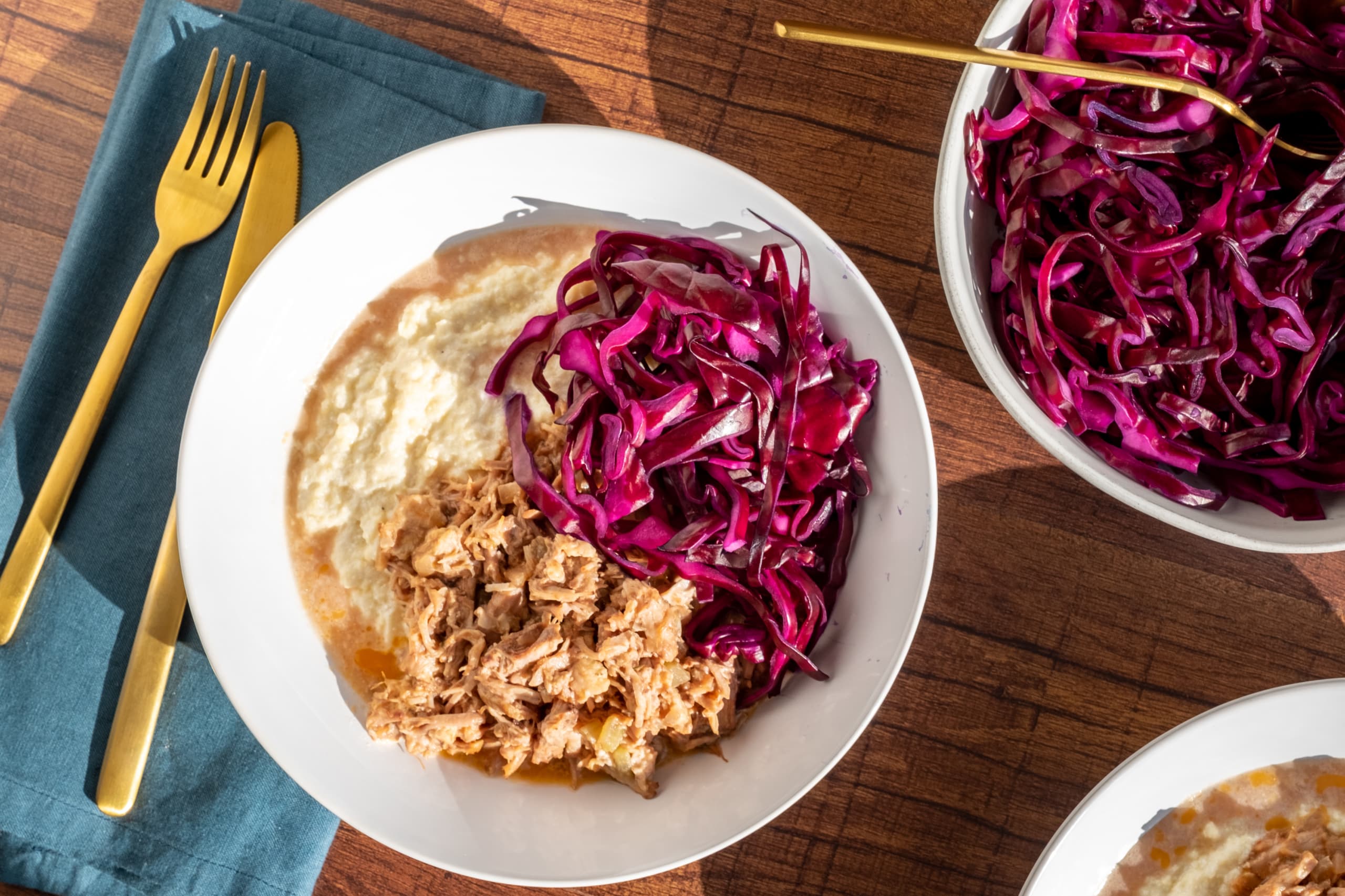 Braised Pork over Cauliflower Mash with Cabbage Slaw
