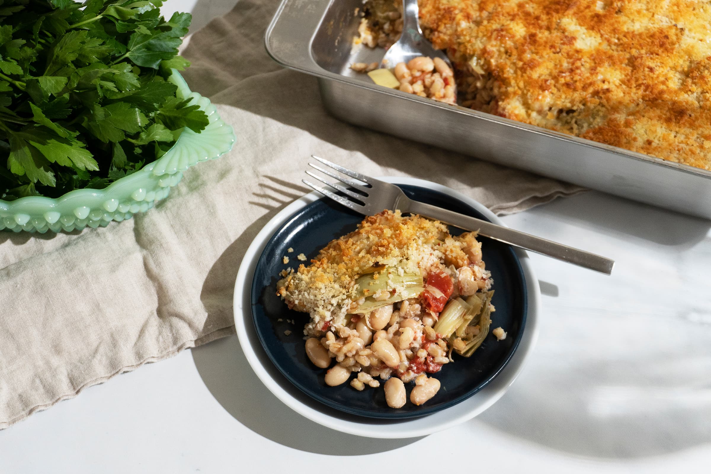 Creamy Barley, Artichoke, & White Bean Gratin