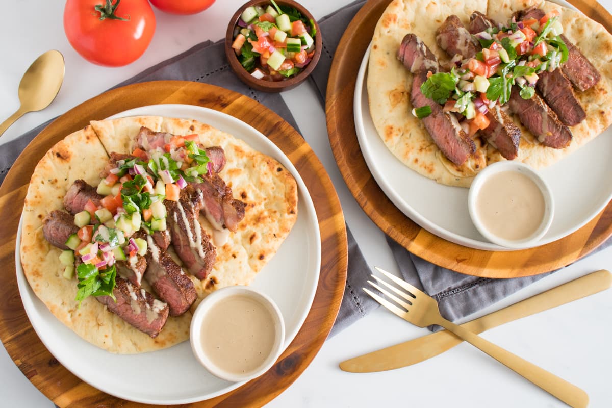 Cumin Steak Shawarma with Israeli Chop Salad and Tahini