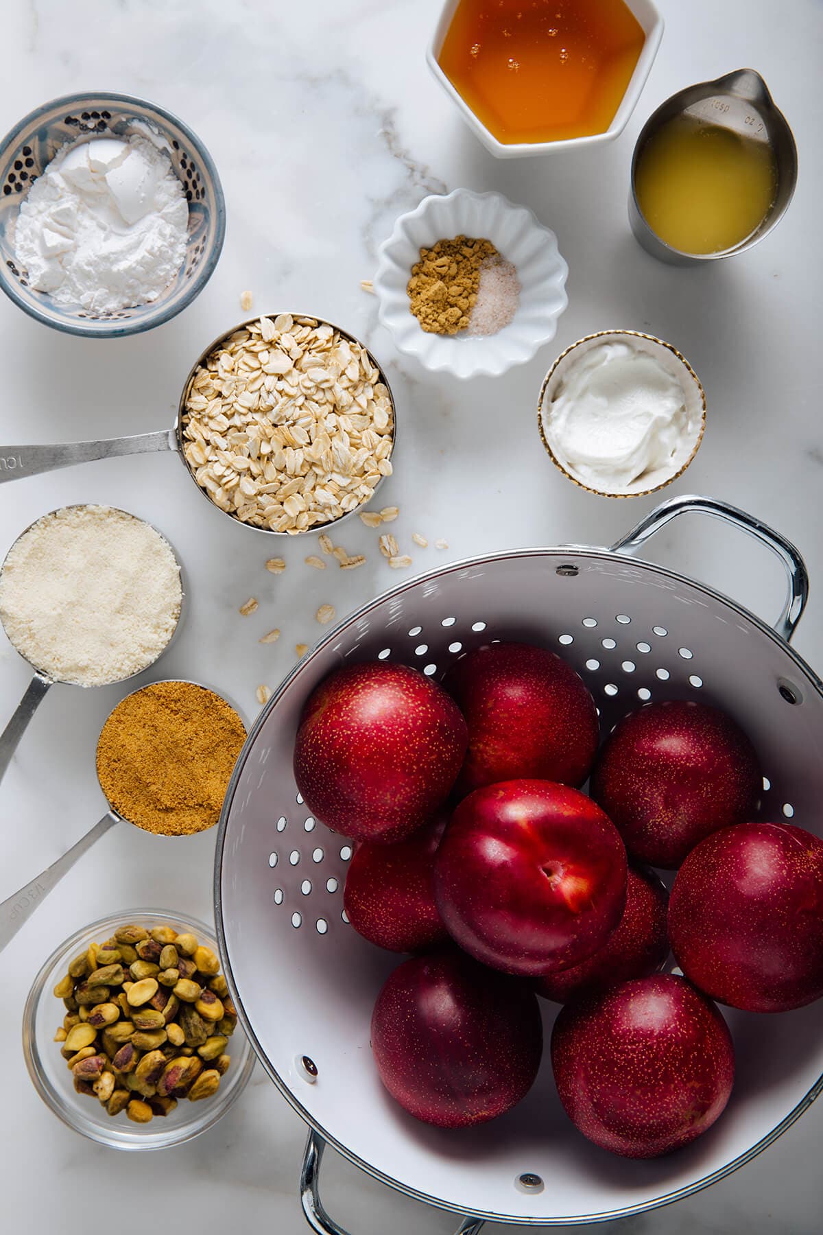 Gluten-Free Plum Crisp with Pistachio, Oat and Almond Topping