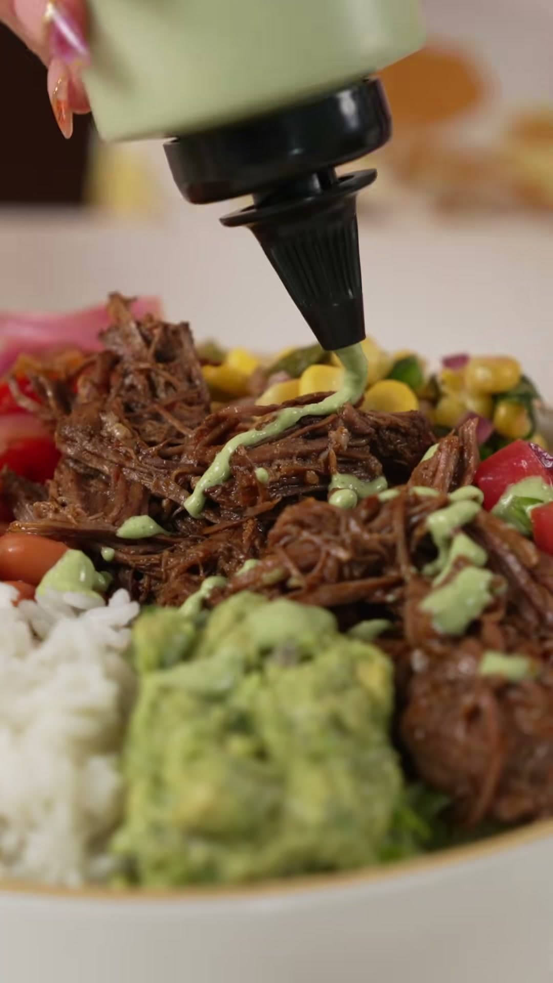 Shredded Beef Burrito Bowl with Corn Salsa and Queso