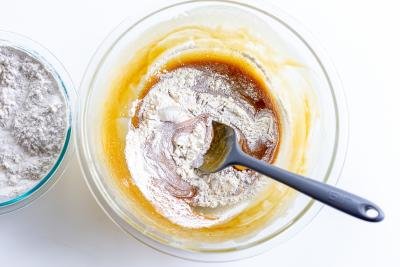 flour with egg mixture in a bowl