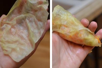 Hand with cabbage leaf, another and with cabbage roll