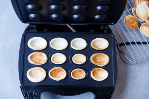 Cooked Walnut Shaped cookies in an electric Rosberg cookie press