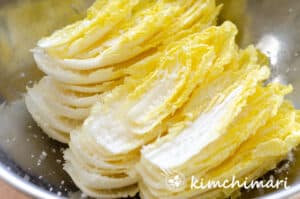 cabbage leaves salted in bowl