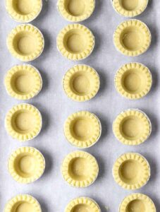 Thawed tart shells ready to bake.