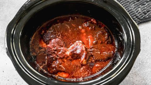 juicy bbq crockpot pork chops ready to serve