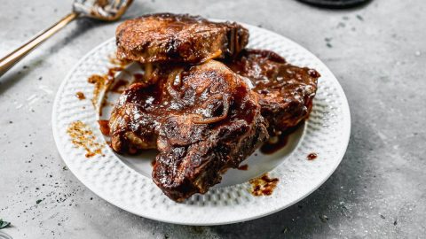 a platter of juicy crockpot pork chops without canned soup